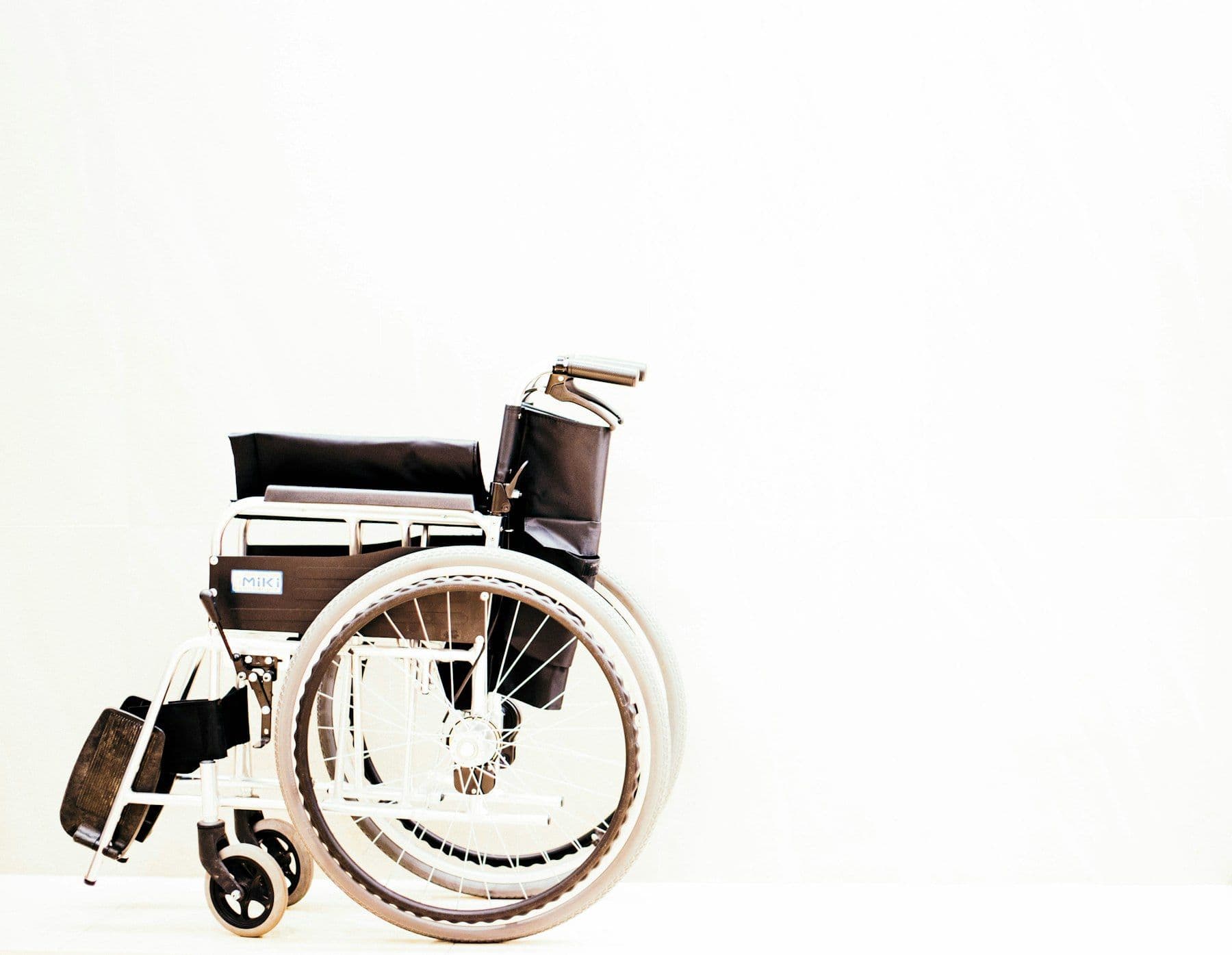 A wheelchair on a white background